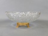 an image of a glass bowl on a gold stand