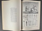 an open book with a drawing of a man on a horse and a man on a horse