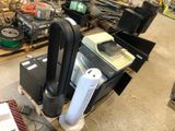 a pile of electronics and other items on a pallet