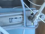 a close up of a machine with wires attached to it