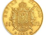 l'image d'une pièce d'or sur laquelle figurent des armoiries