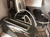 a toaster and a toaster sitting on a kitchen counter