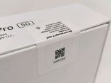 the back of a white box with a qr code on it