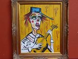 tableau représentant un clown jouant de la guitare devant un mur rouge