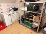 a small kitchen with a lot of clutter on the floor