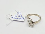 a close up of a diamond ring with a price tag on it