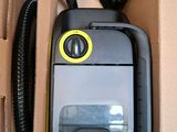 a box with a vacuum in it and a hose in it