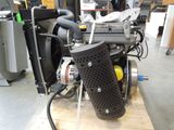a motor that is sitting on top of a wooden table