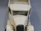 a small toy truck that is sitting on a table