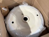 a box with a white object inside of it