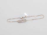 a white gold bracelet with diamonds and a clasp