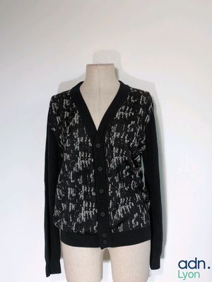 black and white cardigan sweater on a mannequin mannequin mannequin mannequin mannequin mannequin mannequin mannequin