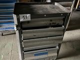 an image of a metal workbench in a garage