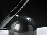 a knife that is sitting on top of a black object