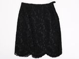 a black skirt with lace on the bottom