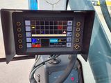 a monitor on the back of a truck on the street