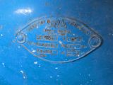 a close up view of a blue metal object