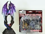 a figurine of a dragon with a purple and black dragon on it