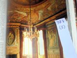 an open book with a picture of a room in it