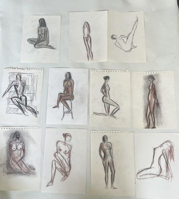 sketches of a woman sitting on a chair in front of a mirror