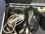 a suitcase with a bunch of electronics inside of it
