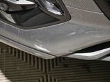 a close up view of a car ' s front bumper