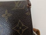 a close up of a brown louis vuitton bag