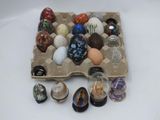 a tray with eggs and other glass objects on a table