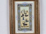 framed picture of a painting of a horse and rider in a landscape