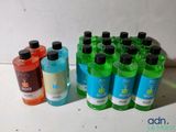several bottles of alcohol are lined up next to each other