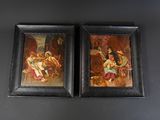 two framed paintings of a man and a woman sitting on a couch