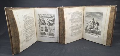 an open book with a picture of a man on a horse on it