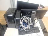 a desktop computer sitting on top of a desk next to a keyboard and monitor