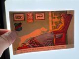 a picture of a woman sitting in a chair with a dog