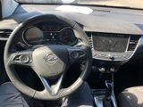 dashboard of a car with a steering wheel and dashboard gauges