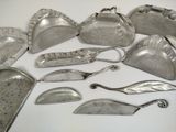 a lot of silver items that are on the table