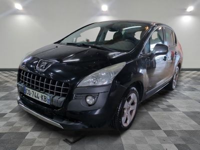 a picture of a black car parked in a garage