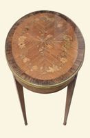 Table de milieu de section ovale, en bois de rose et bois de… (photo 3)