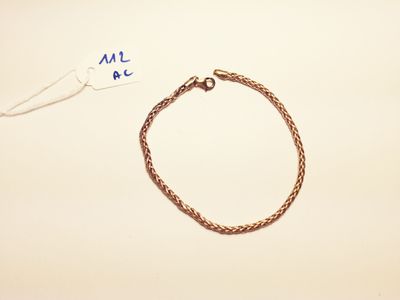 a bracelet that has been placed on a table