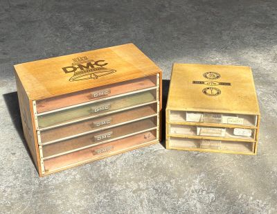 two boxes that are sitting next to each other on the floor