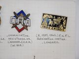 some pins that are on a piece of paper