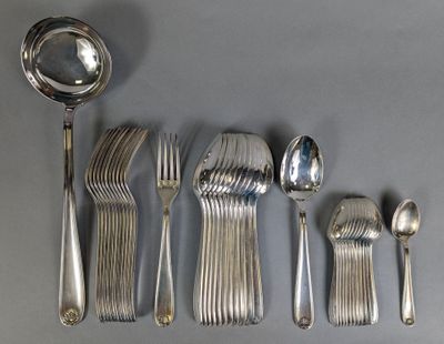 a lot of silver spoons and spoons on the table