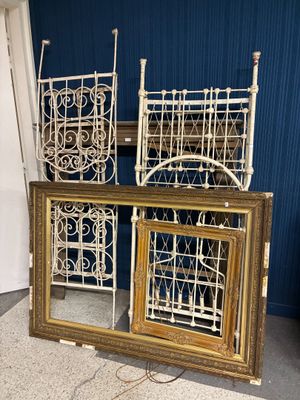 a picture of a pair of antique iron bed frames
