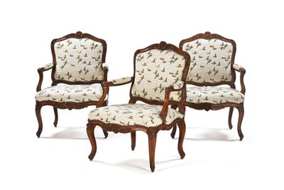pair of louis xv style walnut armchairs with upholstered upholstered seats