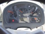 a view of the dashboard of a car from the driver ' s seat