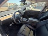 a view of a car ' s interior from the passenger seat