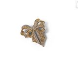 an image of a diamond bow brooch on a white background