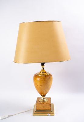 Lampe à poser, le fut ovoïde recouvert de cuir beige reposan…