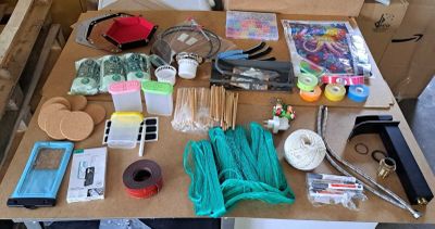 a table with a lot of craft supplies on it