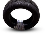 a tire that is sitting on top of a piece of paper